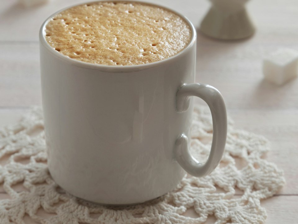 Coffee with marshmallows on a lace doily